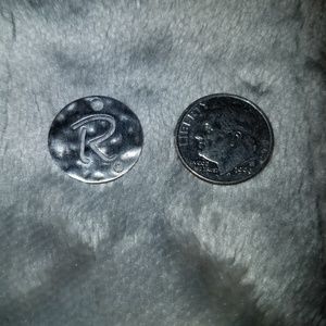 Sterling silver "R" sand dollar pendant